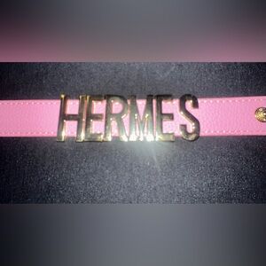 Hermes Pink leather bracelet with Gold Lettering